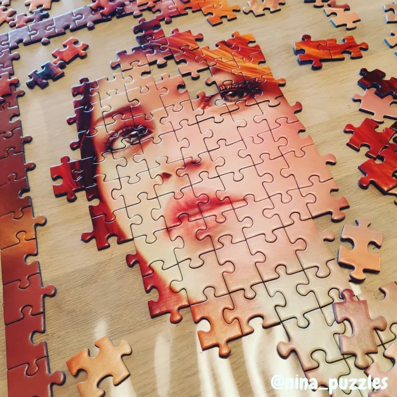 تصویر چیده شده پازل ۱۰۰۰ تکه فرشته ای با بالهای پروانه اثر ملانی دلون